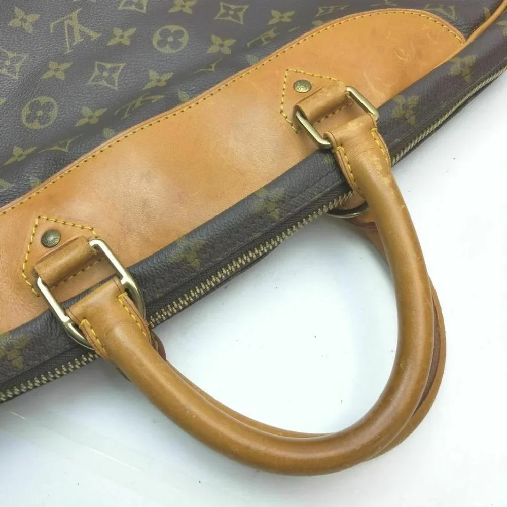 Louis Vuitton Monogram Alize 1 Poche Carryon Lugga